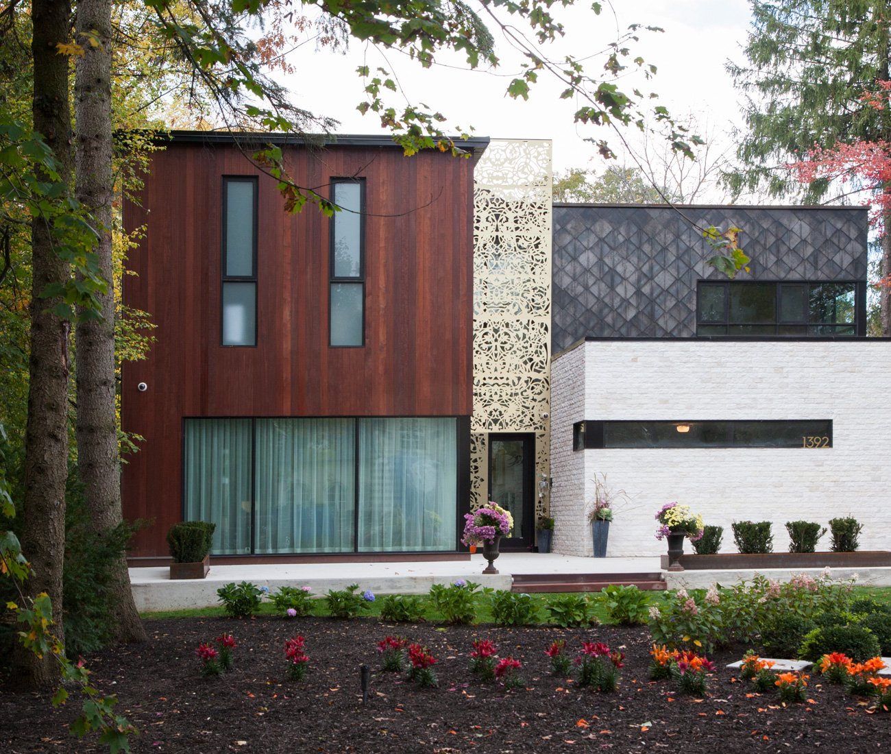 Modern home with different siding materials, Cumaru wood, Corten steel and white quartz